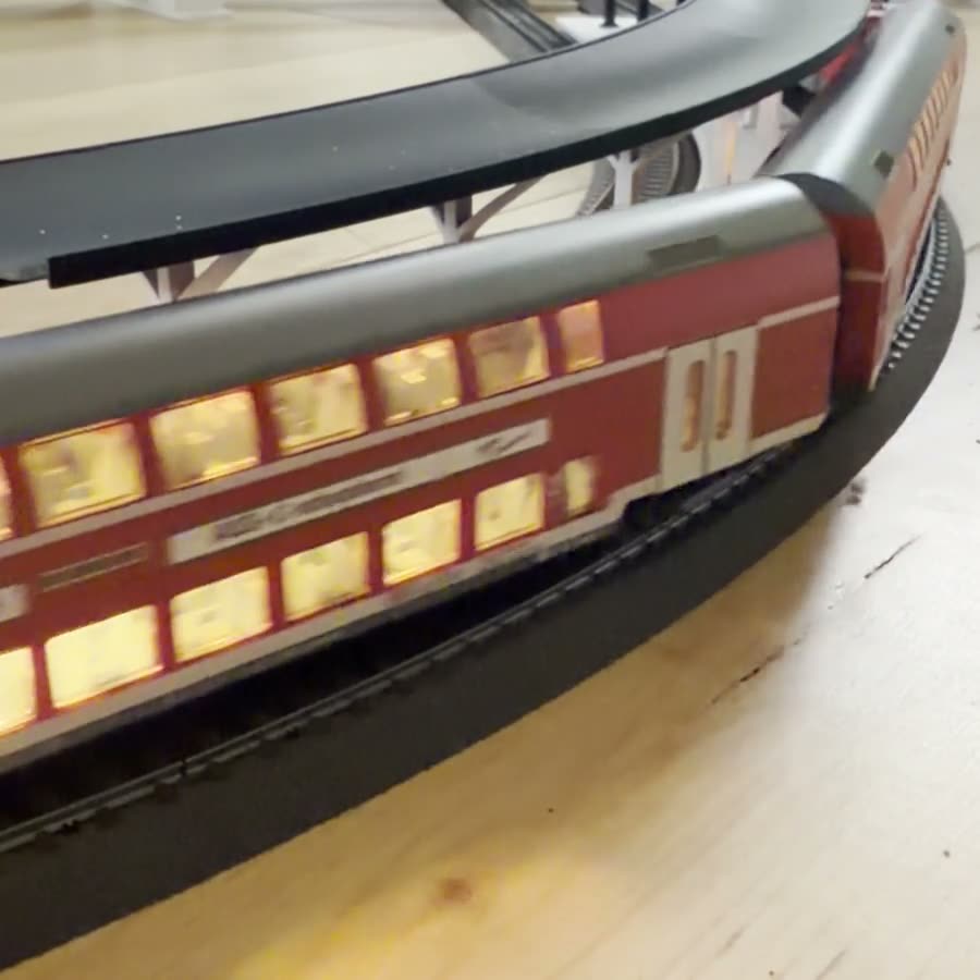Video: double-decker train passing under the curved canopy