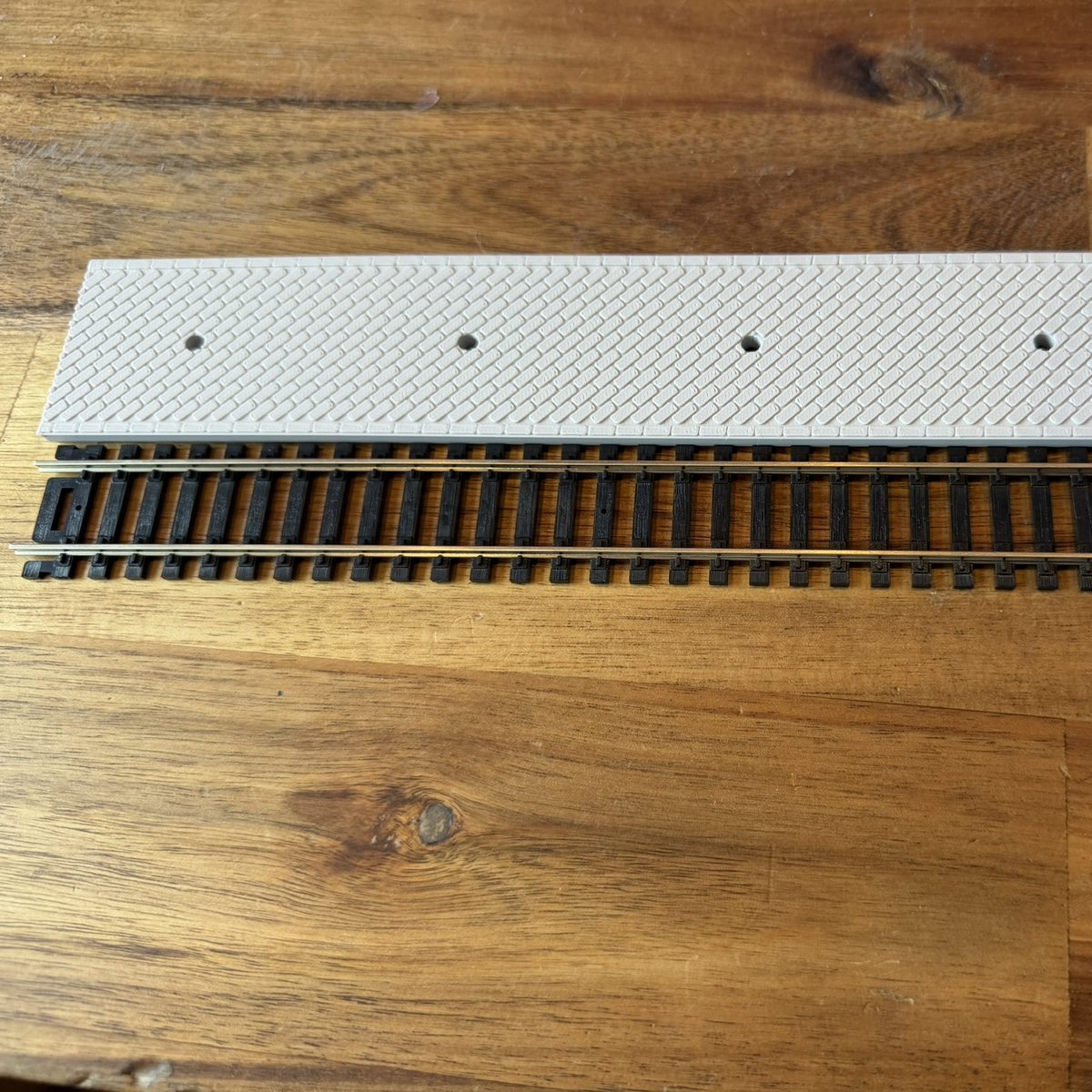 Real print: the platform end lined up with the end of the 9 in Atlas track section