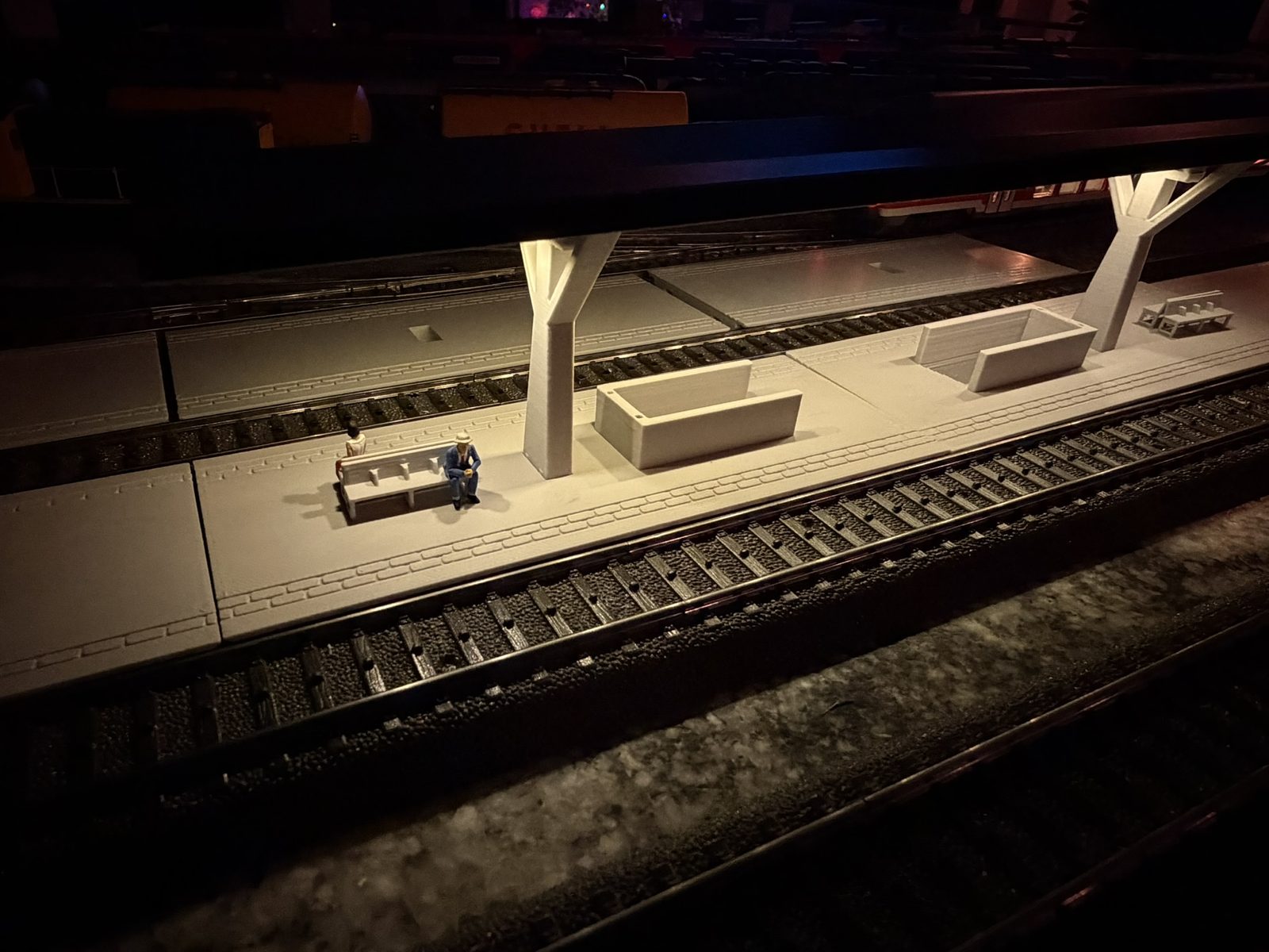 Real print: the two-module V roof station on the layout with both stair housings